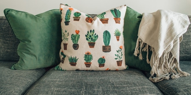 Cactus pillows on a couch.