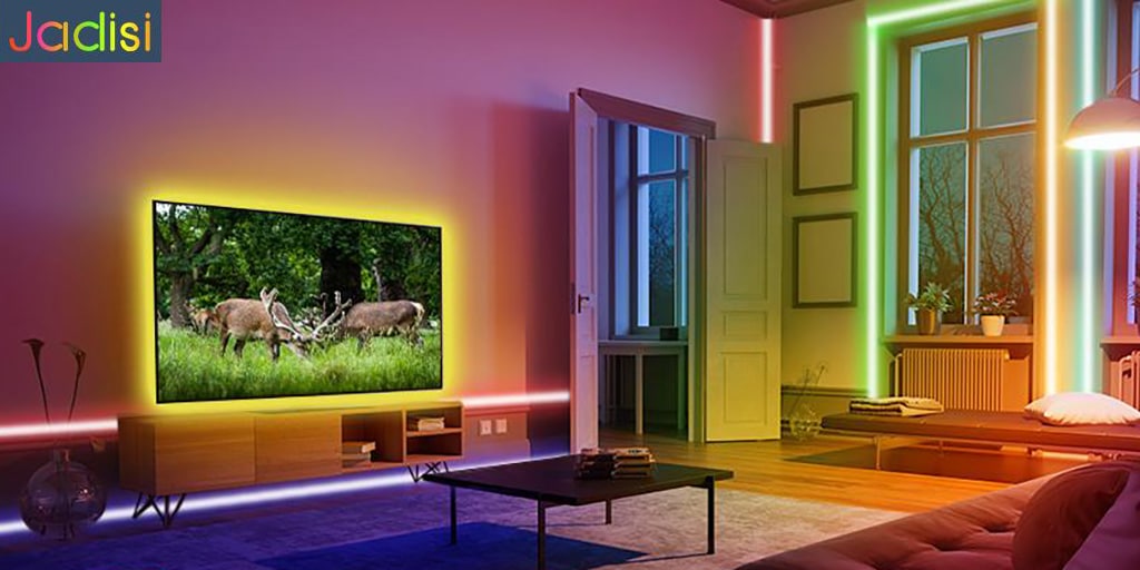 A living room with colorful lights and a tv.